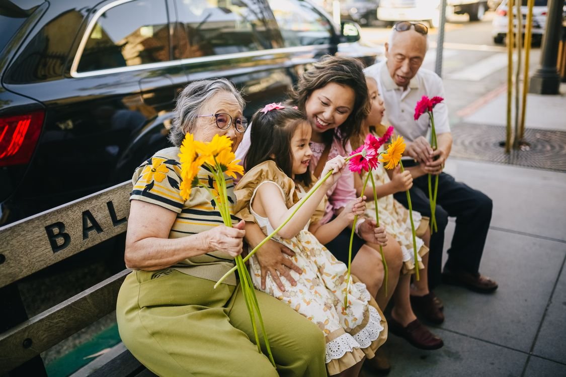 Stock photo of a multigenerational family spending time together outdoors